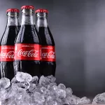 Three bottles of Coca-Cola