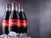 Three bottles of Coca-Cola