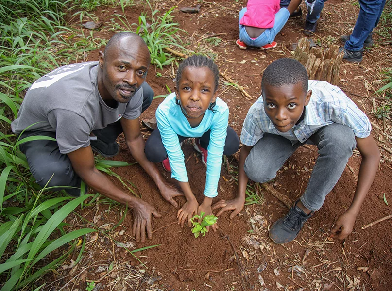 Java House Children and man in field