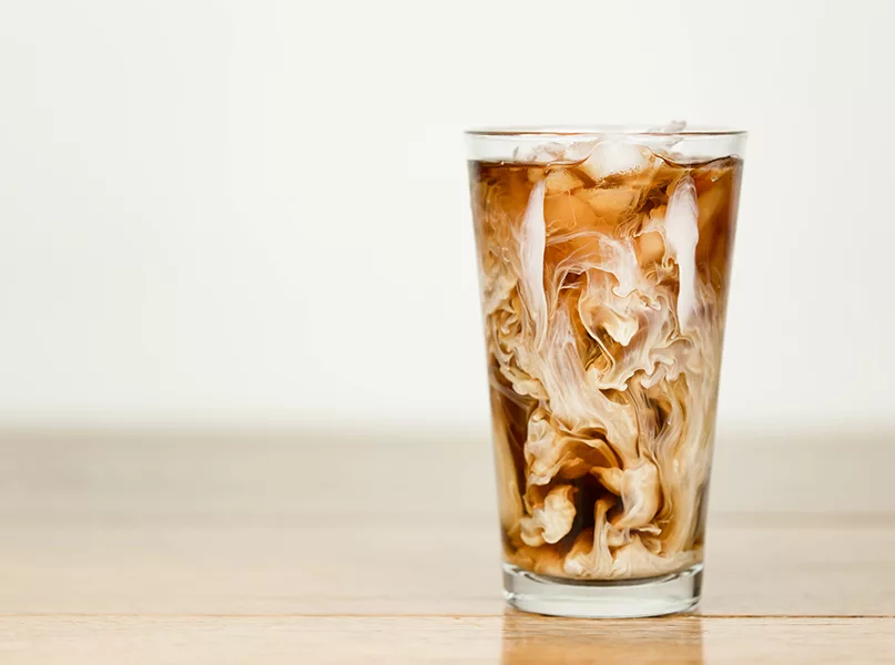 Iced coffee on a wood table