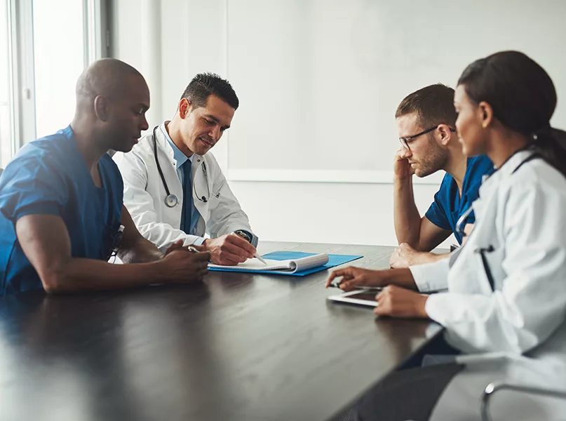 Medical team having a meeting with doctors.