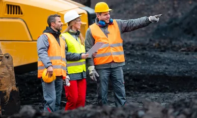 Three workers in quarry