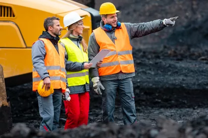 Three workers in quarry
