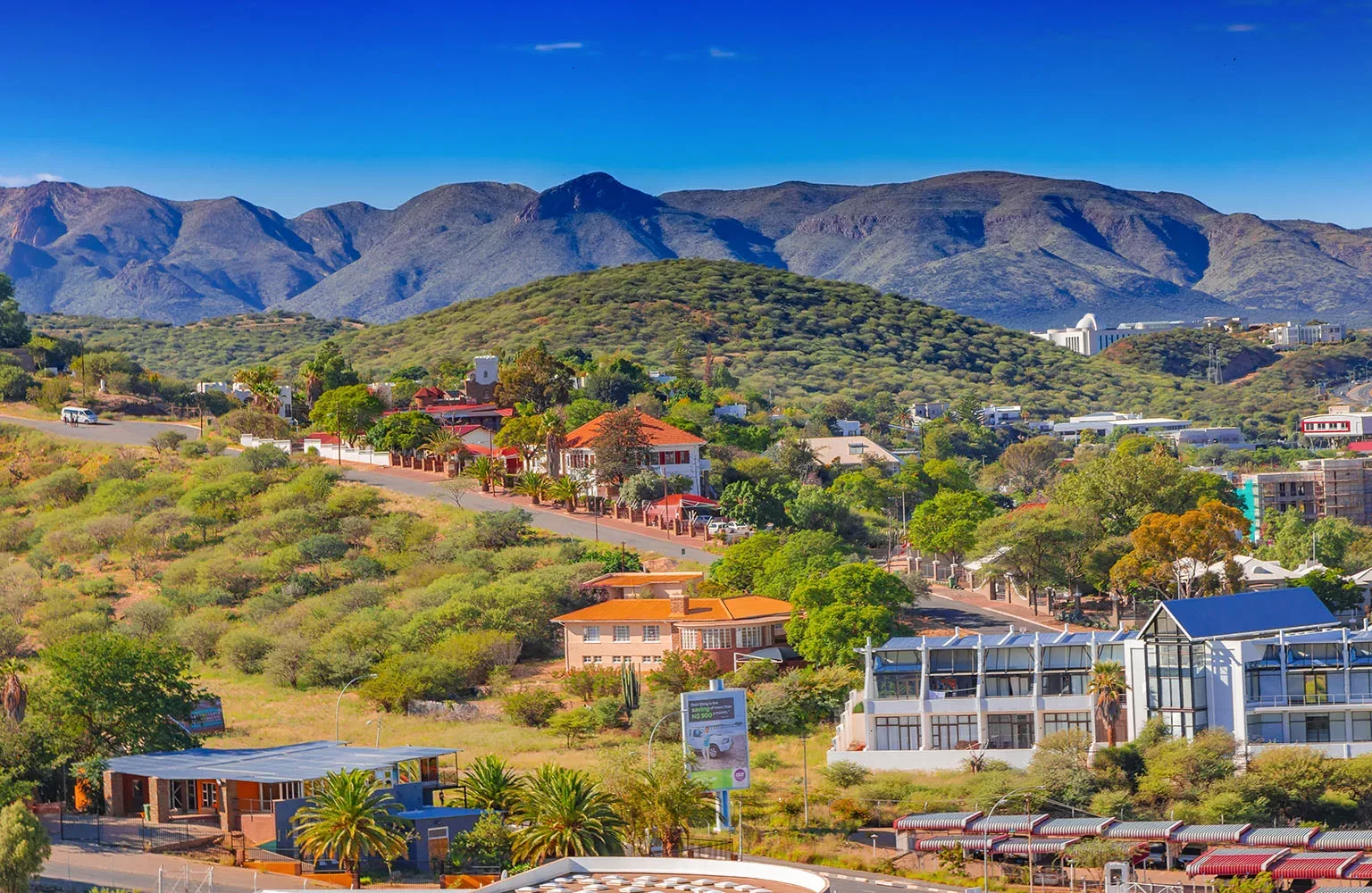 Skyline of Namibia's capital Windhoek with a cloudy sky