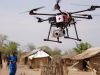 Drone delivering aid to an African village